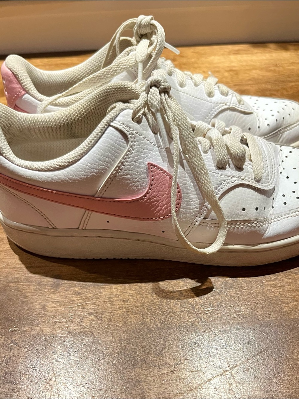Nike Women’s White Sneakers with Pink Swoosh